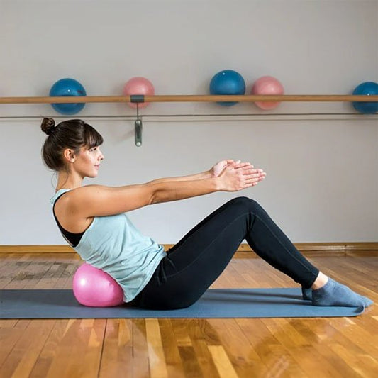 Ballon pilates travail la stabilité du bas de dos