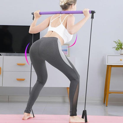 femme pratique Pilate avec Élastique musculation 
